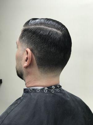 Side Part along with a Taper Fade