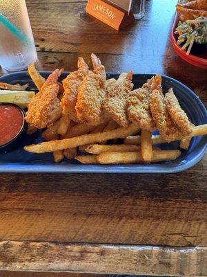 Frozen breaded over-fried inedible shrimp