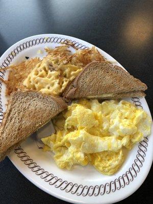 Three Eggs, Wheat Toast, Hash Browns: Smothered, Covered, & Peppered.