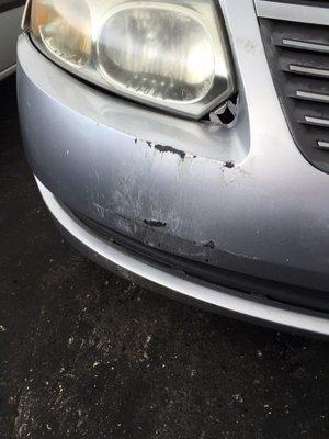 They told me my car was like that, weird all the cars have the the same scratch on the bumper