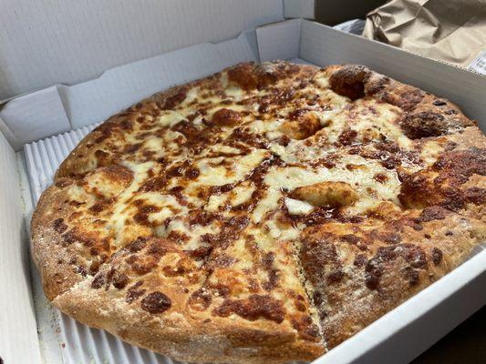 Cheesy white garlic sauce pizza.