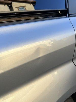 Dent caused by the car wash attended.