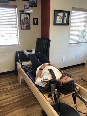 Our tech Maddy demonstrates foot work on the reformer.