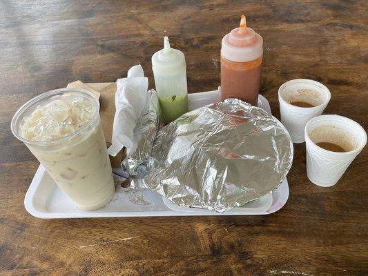 Our $62 meal for lunch - ouch! That's 2 entrees, 5 tacos, and a 1-size horchata. The 2 sample cups of atole were free.