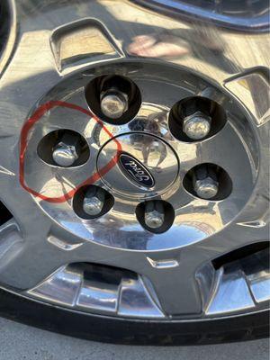 Ensure you have every lug nut before driving off.  I didn't notice until I had very bad wobbly experience when braking down Cajon Pass.