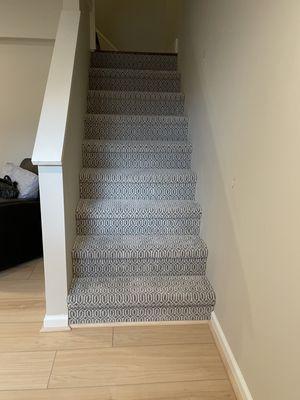 Carpet installed on stairs.