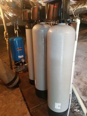 The Jones family ditched their old equipment to upgrade to a new RainSoft Water Softener, Acid Neutralizer, and Iron Filter.