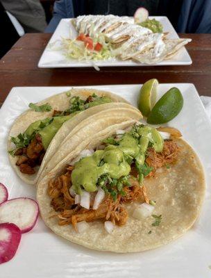 Spicy chicken tinga taco, al pastor taco, chicken quesadilla