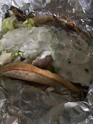 Gyro with an awesome amount of Tzatziki sauce