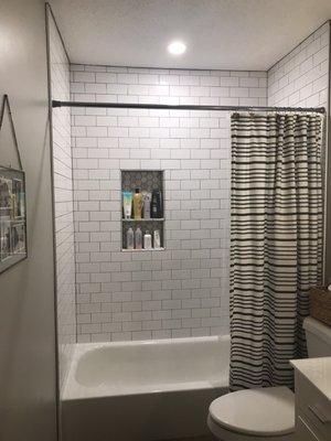 New tile and refinished tub