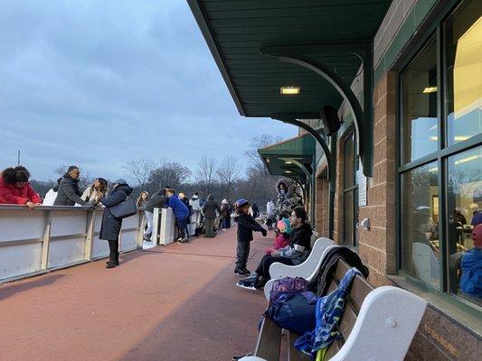 Small seating area for parents and outing on skates.