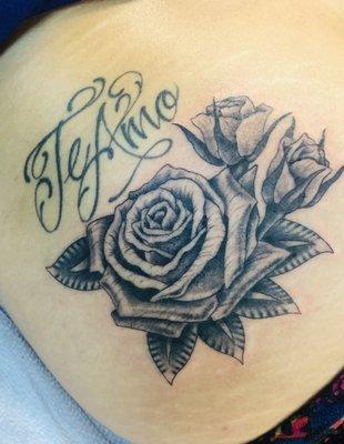 In this pic, the script is fully healed and the roses are fresh.