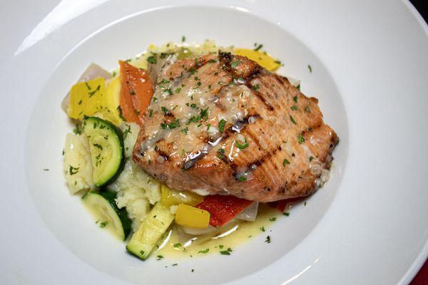 Grilled Salmon with mashed potatoes, seasonal veggies, and a lemon beurre blanc.