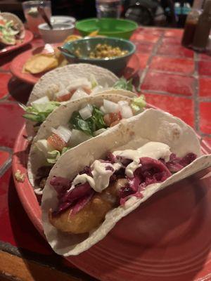 Fish, carnitas, shredded beef tacos