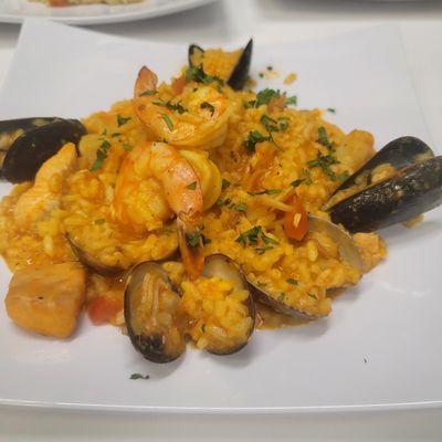 Risotto Frutti di Mare. Specialty of the house . Im a seafood lover and this is it.