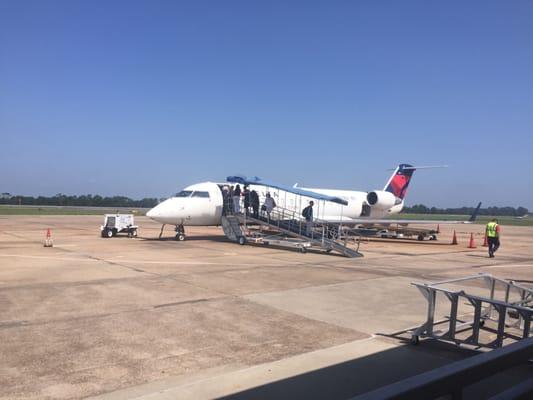 You'll walk onto the tarmac to get on the plane here.