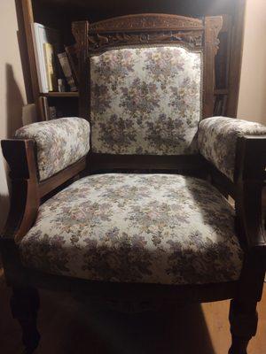 The chair has returned to being in front of a book case. We will get many years of wear out of this high quality fabric.