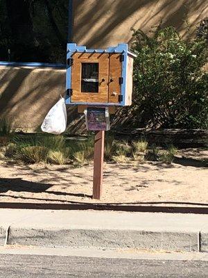 Free Little Library bookcase at corner of Richmond Drive SE & Linda Vista Ave SE