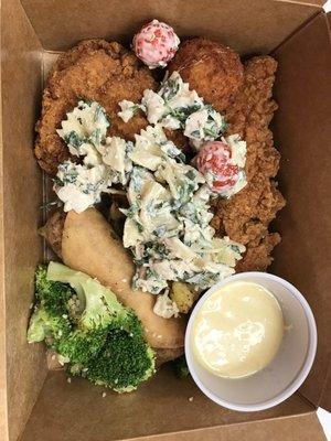 Hot bar and salad bar - chicken breast, broccoli and cauliflower, chicken pasta salad, egg roll