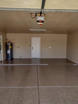 GARAGE AFTER. Rueben removed cabinets and wall, a/c unit, moved attic access, repaired drywall and painted.  Outstanding job!  5 STARS!