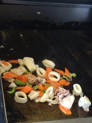 Mediterranean calamari being prepared