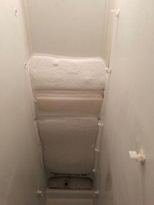 Repairing a side by side defrost issue house refrigerator