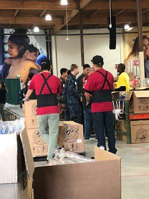 Samaritans Purse workers and Navy cadets