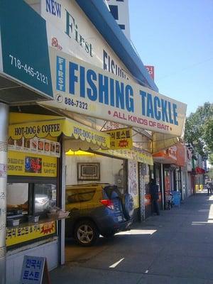 On the side of the First Fishing Tackle shop on Northern Blvd.