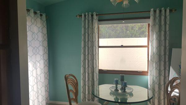 Breakfast Room is soothing with aqua and white decor