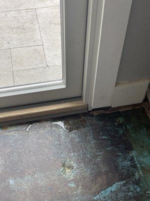 Improperly sealed doors that caused flooring damage