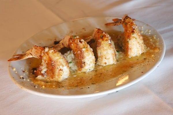 Baked Shrimp- 4 jumbo U-10 Shrimp lightly breaded then topped with Parmesan and Garlic Butter.