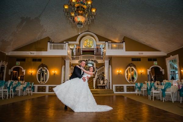 Groom dipping the Bride on the Tiffany Ballroom dance floor.