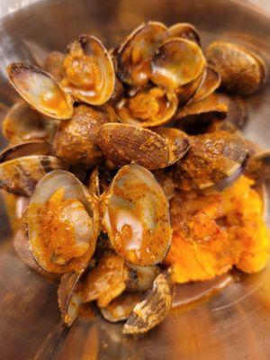 Clams and a lobster tail on Allsome sauce spicy