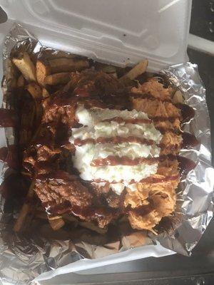 Half and half. Pulled pork and buffalo chicken loaded fries with slaw!!!