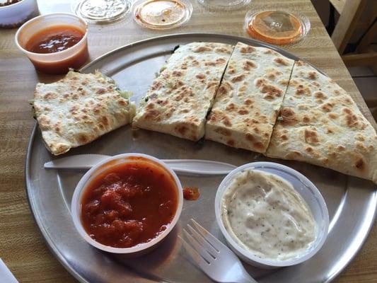 Spinach, onion and mozzarella cheese quesadilla with buffalo and white dipping sauce. Excellent!