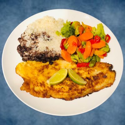 Pescado a la Plancha. The BF liked it. I chose Rice & Black beans and vegetables as his sides.