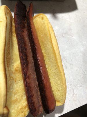 Vienna dog sliced and partially "charred"