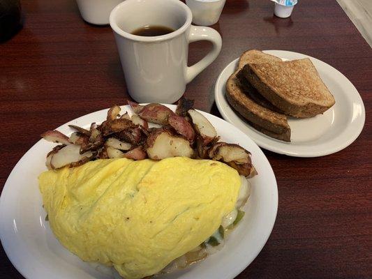 Sweet Italian sausage, peppers, onions, cheese omelette. Excellent!