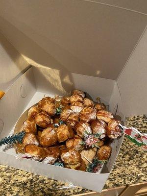 Entire croquembouche collapsed on its own. Now we have to throw it away and try to find a pie or something on Christmas morning.