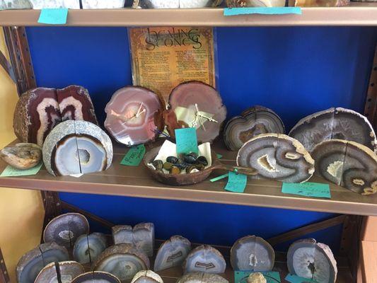 Assortment of geode book ends and clocks