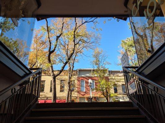 View from the bottom of the staircase leading to Beat Book Shop from the Pearl Street Mall.