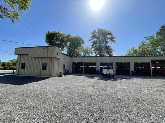 their auto repair building is adjacent to their tire repair building