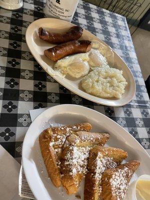 French toast, two eggs with sausage and grits