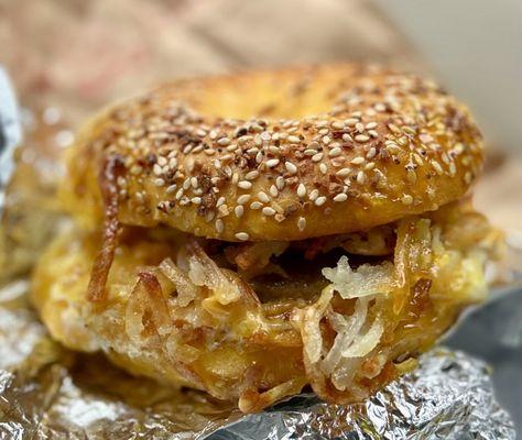 Egg Everything Bagel with Sausage Eggs Cheese and hash brown