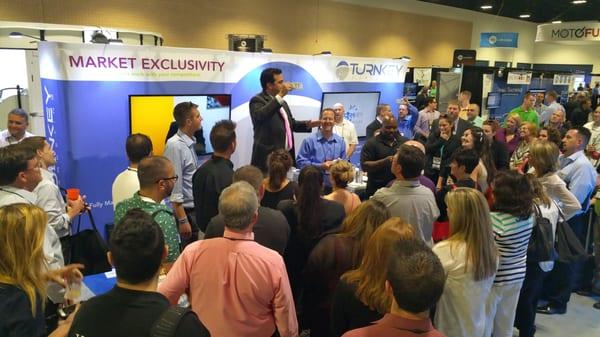 Corporate Entertainer Richard Steele dominating the trade show floor for his clients.