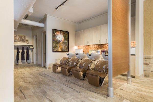 The relaxing shampoo area at Vanity Salon, the best salon in Houston Heights, featuring Houston's best haircuts and and Aveda salon products