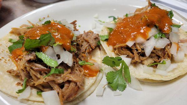 Tacos with carnitas.  The pork is moist and delicious!  (Yes, they do Taco Tuesdays.)