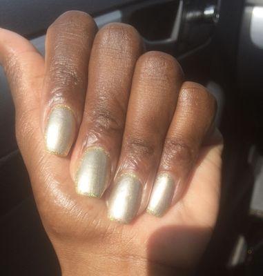 Light gold nails with dark gold trim