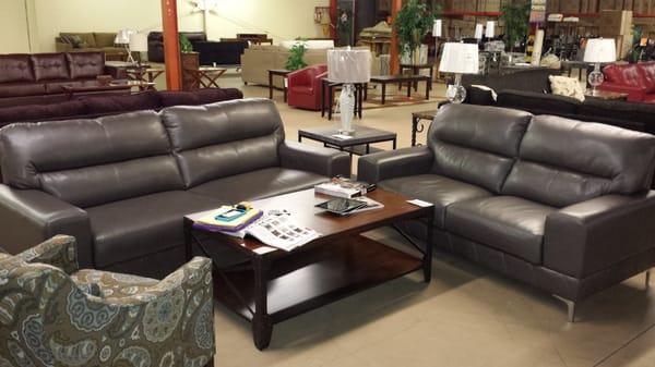 The leather sofa and matching love seat.