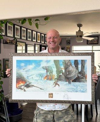 Dave Dorman artwork, with a frame recommended by Regina, which superbly matched the steel look of the legs of the AT-AT.